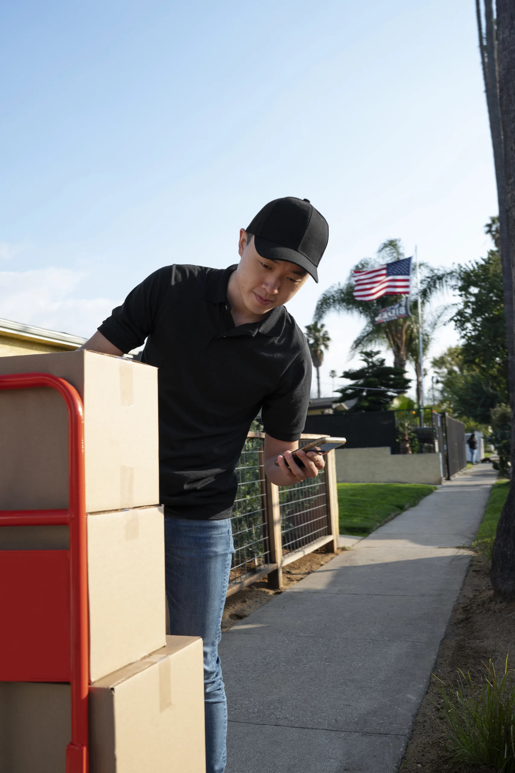 Trucking Operations & Dispatch Canada driver checking delivery details during local freight operations