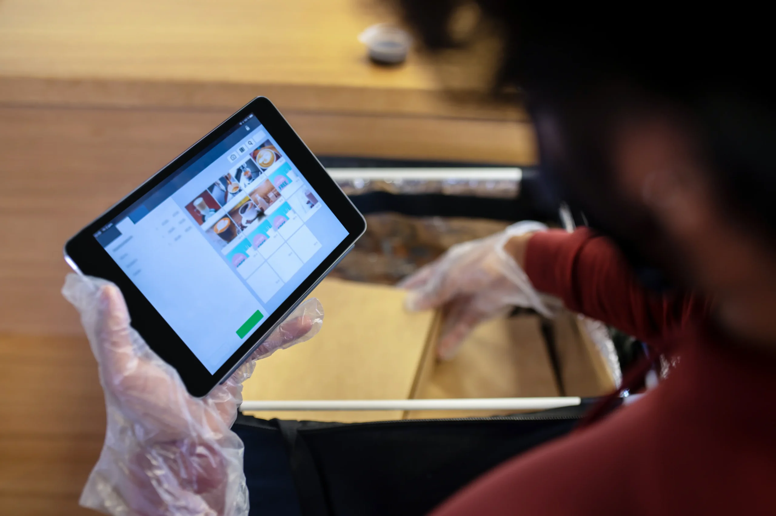 Freight Marketplace & Posting Platforms warehouse worker using tablet for freight management